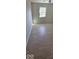 Bedroom featuring hardwood floors, a window offering natural light, and neutral-toned walls for a serene feel at 8277 Sobax Dr, Indianapolis, IN 46268