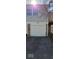 Exterior of home featuring a garage, house number and brick accents at 8277 Sobax Dr, Indianapolis, IN 46268