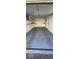 Clean empty garage interior with storage shelves at 8277 Sobax Dr, Indianapolis, IN 46268