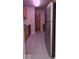 Bright kitchen featuring wooden cabinets, tile flooring, and stainless steel refrigerator at 8277 Sobax Dr, Indianapolis, IN 46268