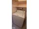 White laundry machine in laundry area at 8277 Sobax Dr, Indianapolis, IN 46268