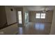Bright living room featuring natural light, wood floors, and ceiling fan at 8277 Sobax Dr, Indianapolis, IN 46268