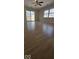 Bright living room featuring hardwood floors, large windows, and a sliding door to the outside at 8277 Sobax Dr, Indianapolis, IN 46268