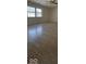 Spacious living room with natural light, laminate flooring, and a ceiling fan for comfort at 8277 Sobax Dr, Indianapolis, IN 46268