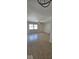 Spacious living area with laminate flooring, ceiling fan, and bright natural lighting at 8277 Sobax Dr, Indianapolis, IN 46268