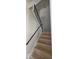 Wooden staircase with black metal railing offers a sleek, modern design and ensures safety at 8277 Sobax Dr, Indianapolis, IN 46268
