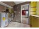 The basement features a vintage-style ceiling fan at 8722 Shelby St, Indianapolis, IN 46227
