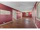 Spacious living room featuring hardwood floors with view into the kitchen at 8722 Shelby St, Indianapolis, IN 46227