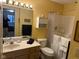 Bright bathroom features a Safe Step Walk-in Tub, vanity, sink, and fixtures at 8820 Yardley Ct # 103, Indianapolis, IN 46268