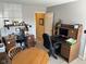Dual home office setup with desks, chairs, storage, and natural light at 8820 Yardley Ct # 103, Indianapolis, IN 46268