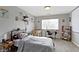 Bedroom features a gray color scheme, a foosball table, a projector and screen, a work space, and several decorative pieces at 9442 Avon Strand # D, Avon, IN 46123