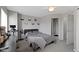 Bright bedroom with natural lighting and en suite access to a private bathroom at 9442 Avon Strand # D, Avon, IN 46123