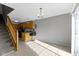 Bright, eat-in kitchen featuring wood cabinets and a counter with barstool seating at 9442 Avon Strand # D, Avon, IN 46123