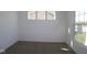 Clean and spacious bedroom with neutral carpeting, white walls, and large windows for natural light at 10027 Redwood Peak Ln, Indianapolis, IN 46259