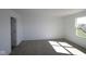 Spacious bedroom with carpeted floors and fresh white paint offering plenty of natural light at 10027 Redwood Peak Ln, Indianapolis, IN 46259