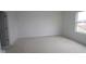 Spacious bedroom featuring a clean and bright setting with a large window and ample space at 10027 Redwood Peak Ln, Indianapolis, IN 46259