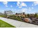 Welcoming entrance to Hickory Run community with lush landscaping and clear blue skies at 10027 Redwood Peak Ln, Indianapolis, IN 46259