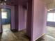 Open floor plan revealing hardwood floors and an adjoining room at 1047 N Concord St, Indianapolis, IN 46222