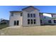 Home's backyard featuring a freshly sodded lawn and expansive exterior view at 10543 Banyan Wood Ct, Indianapolis, IN 46239