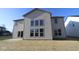 Home's backyard featuring a freshly sodded lawn and expansive exterior view at 10543 Banyan Wood Ct, Indianapolis, IN 46239