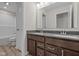 Bathroom with double vanity and shower at 10543 Banyan Wood Ct, Indianapolis, IN 46239