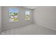 Bedroom with two bright windows at 10543 Banyan Wood Ct, Indianapolis, IN 46239