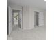 Neutral bedroom featuring a door to another room and a closet at 10543 Banyan Wood Ct, Indianapolis, IN 46239