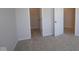 Bedroom with neutral carpet and open closet at 10543 Banyan Wood Ct, Indianapolis, IN 46239