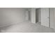Neutral bedroom with plush carpeting, closet space, and fresh paint at 10543 Banyan Wood Ct, Indianapolis, IN 46239