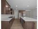Modern kitchen with stainless steel appliances, ample counter space, and sleek cabinetry at 10543 Banyan Wood Ct, Indianapolis, IN 46239