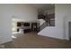 Bright open floorplan with kitchen, fireplace and staircase at 10543 Banyan Wood Ct, Indianapolis, IN 46239
