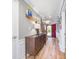 Inviting entryway with a red front door, wooden staircase, and a decorative dresser at 12507 Doe Ln, Indianapolis, IN 46236