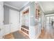 Well-organized foyer with a built-in bench and storage space with decorative baskets at 12507 Doe Ln, Indianapolis, IN 46236