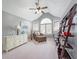 Cozy office features a chaise lounge, built in shelving, and natural light at 12507 Doe Ln, Indianapolis, IN 46236