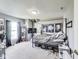Spacious bedroom with carpet, gray walls, and natural light from window at 12552 Majestic Way, Fishers, IN 46037