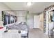 Bedroom featuring posters, carpeted floors, large bed, and natural light at 12552 Majestic Way, Fishers, IN 46037