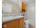 Standard bathroom featuring a wood vanity, white countertop, and combination shower and tub at 1321 Savannah Blvd, Shelbyville, IN 46176