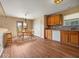 Eat in dining area featuring wood cabinets, stainless dishwasher, and plenty of natural light at 1321 Savannah Blvd, Shelbyville, IN 46176