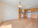 Spacious kitchen/dining area features stainless appliances, granite countertops and wood floors at 1321 Savannah Blvd, Shelbyville, IN 46176