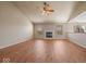 Spacious living room featuring hardwood floors and a cozy fireplace at 1321 Savannah Blvd, Shelbyville, IN 46176