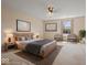 Comfortable bedroom with neutral paint, plush carpet, and large windows at 1321 Savannah Blvd, Shelbyville, IN 46176