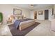 Warm, inviting bedroom with neutral tones, plush carpet, and ample natural light at 1321 Savannah Blvd, Shelbyville, IN 46176