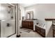 Relaxing bathroom with tub, glass shower, vanity, and modern fixtures at 1513 Tottenham Dr, Danville, IN 46122