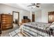 Spacious bedroom showcases a large bed, dresser, and neutral walls at 1513 Tottenham Dr, Danville, IN 46122