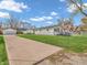 Spacious driveway leads to this house with a detached garage and large backyard at 1816 N Moreland Ave, Indianapolis, IN 46222