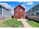 Charming backyard with green grass, patio, and secure fence offering a private outdoor space at 2018 Cornell Ave, Indianapolis, IN 46202
