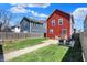 Spacious backyard featuring a well-maintained lawn, patio area, and secure fencing for outdoor enjoyment at 2018 Cornell Ave, Indianapolis, IN 46202
