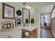 Charming bathroom with unique decor, a modern vanity, and a bright window at 2018 Cornell Ave, Indianapolis, IN 46202