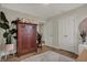 Bedroom featuring light walls, a large wardrobe, and sleek flooring, creating a serene and spacious ambiance at 2018 Cornell Ave, Indianapolis, IN 46202