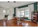 Inviting dining area featuring hardwood floors, stylish decor, and natural light at 2018 Cornell Ave, Indianapolis, IN 46202